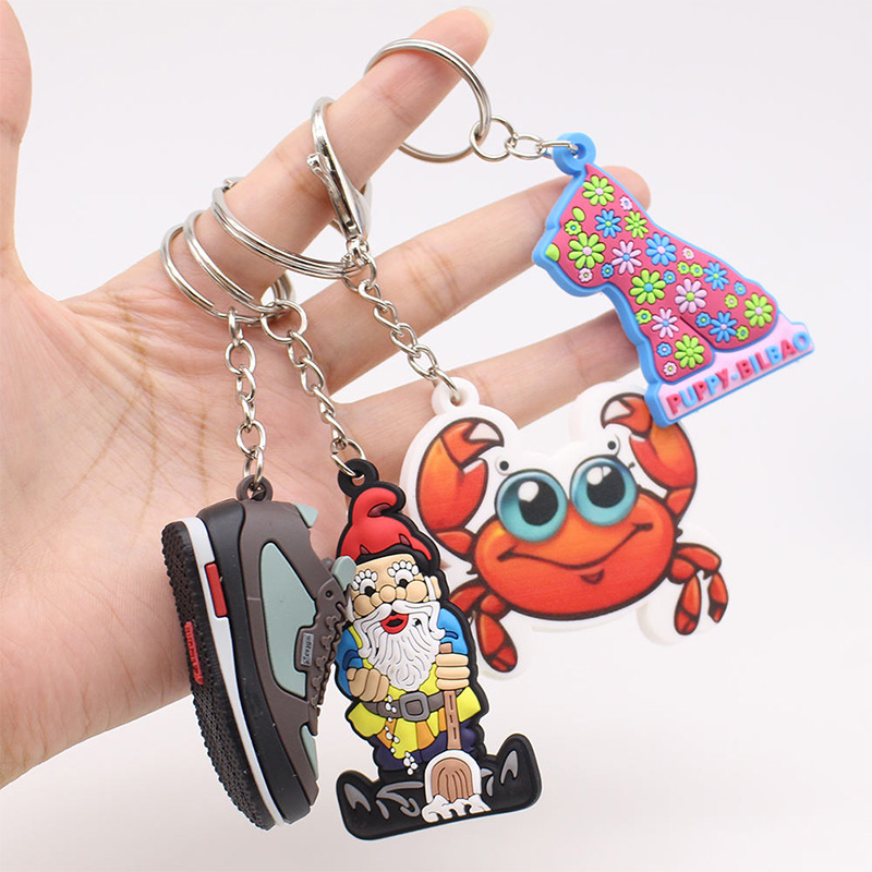 Llavero personalizado de metal con forma de dibujos animados para regalos promocionales.